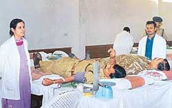 ITBP personnel donate blood at a camp organised by the Basic Training Centre, Bhanu, on the raising day of the Indo-Tibetan Border Police Force
