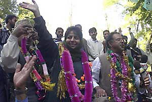PDP leader Mehbooba Mufti waves to her supporters