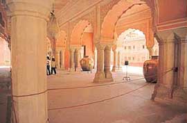 The silver jars carried holy water with which the Maharaja of Jaipur washed himself after shaking hands with King Edward VII