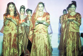 The Alps Magic 2002 displayed hairstyles over the decades.