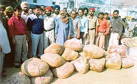 Packs of adulterated khoya that were seized by the district health officails at the Ludhiana railway station on Friday. 