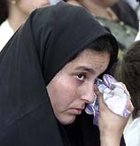 Begum Shabnam Banu, widow of Kargil martyr Rijvan Tyagi of 22 Grenadier, wipes her tears at the inauguration of the Vijai Veer Aawas Parisar