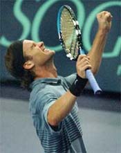 Carlos Moya of Spain reacts after winning his final match