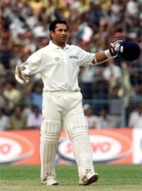 Indian batsman Sachin Tendulkar acknowledges the crowd after scoring his century during the fourth days play of the third Test match