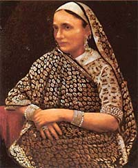 Lady from the Ashburner family in typical Parsi dress. Handcoloured photograph; mid-19th century.