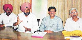 The PCCTU president, Mr S.S. Hundal, along with other office-bearers addresses a meeting of the state executive