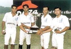 The Jindal Power and Steel team, which won the Pizza Hut Baroda Cup polo title, with the trophy