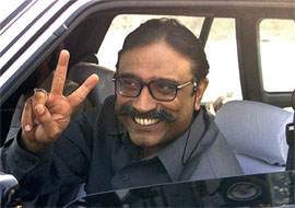 Asif Ali Zardari makes a victory sign