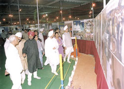 Baba Hardev Singh Ji Maharaj taking a round of the exhibition pandal