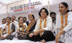 High Court lawyers sitting on one-day hunger strike in the Capital on Friday. They are protesting against the recent Legal Services Amendment Act