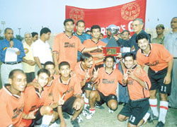 Lt-Governor Vijai Kapoor presenting the Lt-Governors Football Trophy to the Shahdara Club at the Ambedkar Stadium 