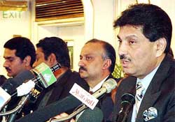 Faisal Saleh Hayat and other newly elected legislators of the Pakistan Peoples Party announce a breakaway faction