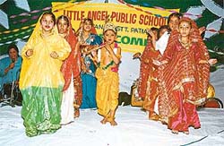 Students take part in a cultural programme at Little Angel Public School, Bartana
