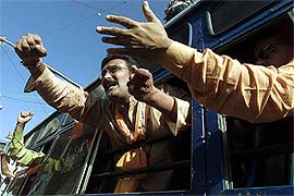 VHP activists shout slogans
