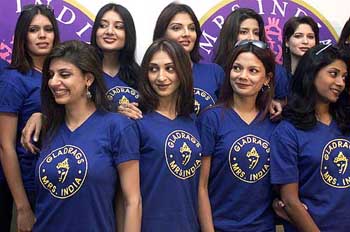 Contestants pose for photographers during the Mrs India 2003 contest