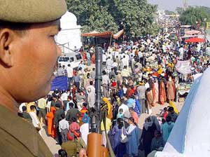 A policeman keeps a tight vigil