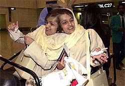Iranian conjoined twins Ladan and Laleh Bijani arrive at Kuala Lumpur International airport