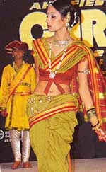A student of the Air Hostess Academy displays a bridal costume at a fashion show in hotel Mountview, Sector 10, Chandigarh, on Friday.