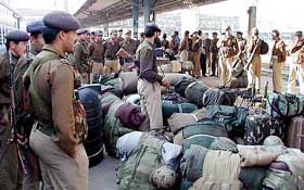 Paramilitary forces, who have arrived for election duty in Gujarat, seen at Ahmedabad railway station on Friday.