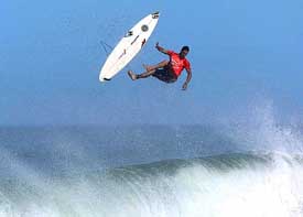 Andy Irons from Hawaii wipes out during the Vans Hawaiian Pro surfing competition