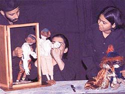 Members of Kat-Katha, an association of puppeteers, present an adaptation of Shakespeares comedy Twelfth Night with rod puppets at CITCOs Drop In restaurant
