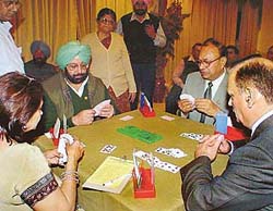 KEEPING HIS CARDS CLOSE TO THE CHEST