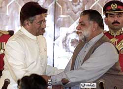 President Gen. Pervez Musharraf greets newly appointed Prime Minister Zafarullah Khan Jamali