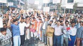 Activists of the Shiv Sena protest against the revocation of POTA