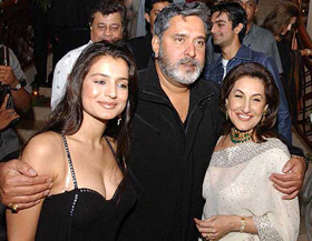 Chairman, UB Group, and MP Vijay Mallaya with Amisha Patel and Reta Mehta at the Cine Blitz relaunch and Hi Blitz launch party in Mumbai 
