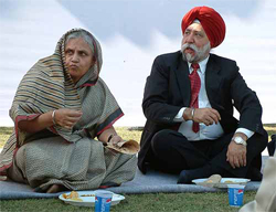 Ms Sheila Dikshit, Chief Minister of Delhi, partakes in a langar 