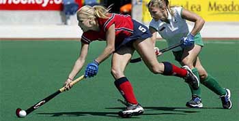 England's Denise Marston-Smith, left, outpaces Ireland's Laura Lee