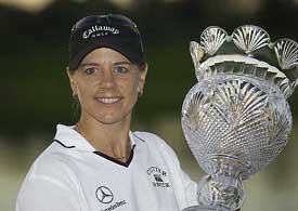 Annika Sorenstam of Sweden holds the LPGA Tour Championship trophy at the Trump International Golf Club in West Palm Beach