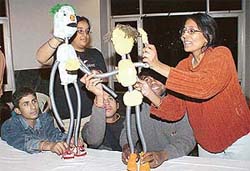 Members of the Chandigarh Sangeet Natak Academy present a puppet show at Kalagram