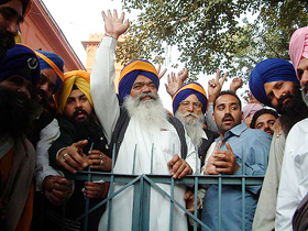 Senior Akali leader and ex-minister Rattan Singh Ajnala and Ranjit Singh Brahampura shout slogans