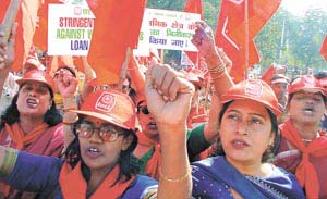 Bank employees under the banner of the All-India Bank Employees Association protest against the government move to privatise public sector banks at Jantar Mantar in the Capital on Wednesday.