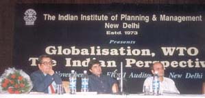 Participants at an Economic Meet organised by the Indian Institute of Planning and Management at the FICCI Auditorium.
