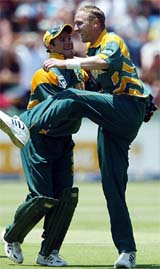South African bowler Allan Donald celebrates with his wicketkeeper Mark Boucher after getting the wicket of Sri Lanka's Hasantha Fernando in the first one-day international match at Wanderers Stadium, Johannesburg