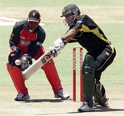 Pakistan opening batsman Saleem Elahi cuts a delivery past Zimbabwe wicket-keeper