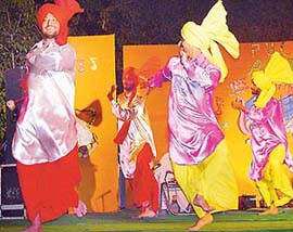 Bhangra team of Guru Nanak Dev University, Amritsar, performs at Aagaaz, the function organised to welcome freshers, at Panjab University, Chandigarh, on Thursday.