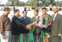 Bangladesh team captain Md Musa being presented the Man of the Match Award in the Shastri Hockey Tournament