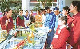 Students show a model