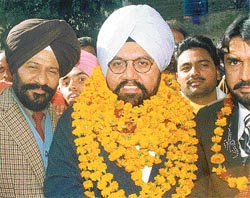 The political secretary to the CM, Mr Harcharan Singh Barsat, being honoured