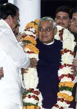 BJP President Venkaiah Naidu garlands Prime Minister Atal Bihari Vajpayee