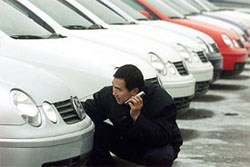 A Chinese man talks on his mobile phone
