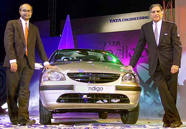 Ratan Tata, Chairman of Tata Engineering, one of India's leading vehicle manufacturers, and V. Sumanthran, Executive Director of the company, presents the company's new passenger car