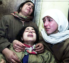 Wailing relatives of the assassinated PDP MLA