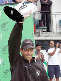 New Zealands captain Stephen Fleming holds up the Test trophy after their victory on day four of the second cricket Test between the New Zealand and India 