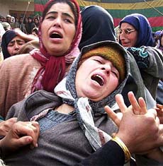 Wailing wife of Zahoor Ahmad who was shot dead by militants