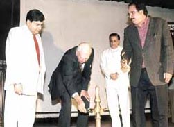 President of HelpAge India M. M. Sabharwal lighting the lamp at the seminar