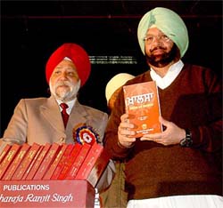 Capt Amarinder Singh, Chief Minister, Punjab, releases a book on Maharaja Ranjit Singh "Khalsa Ithas aatey Vichardhara" at the inauguration of the Indian History Congress at Guru Nanak Dev University, Amritsar